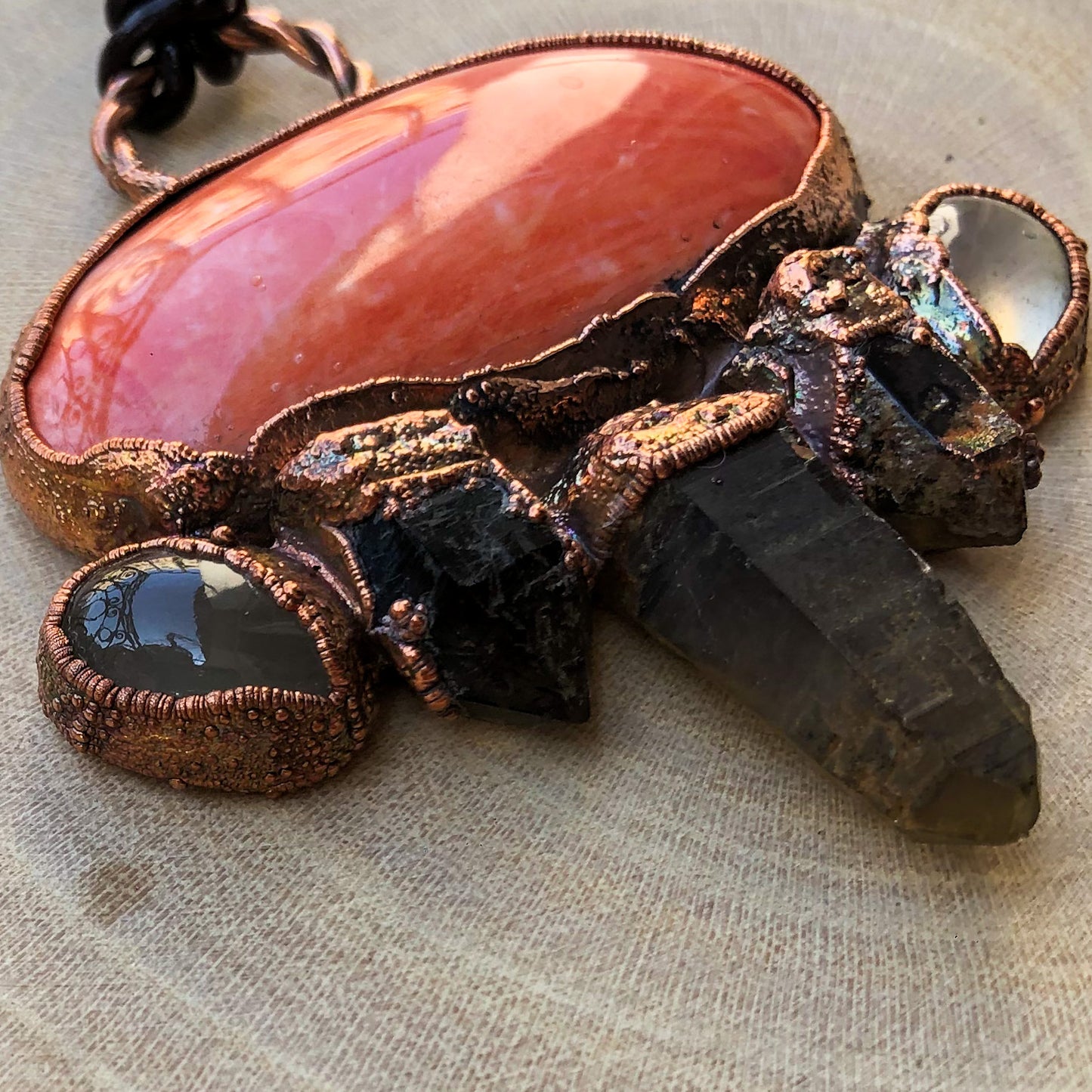 POLISHED SEA SHELL, ST. CATHERINE’S SMOKY QUARTZ & MOONSTONE