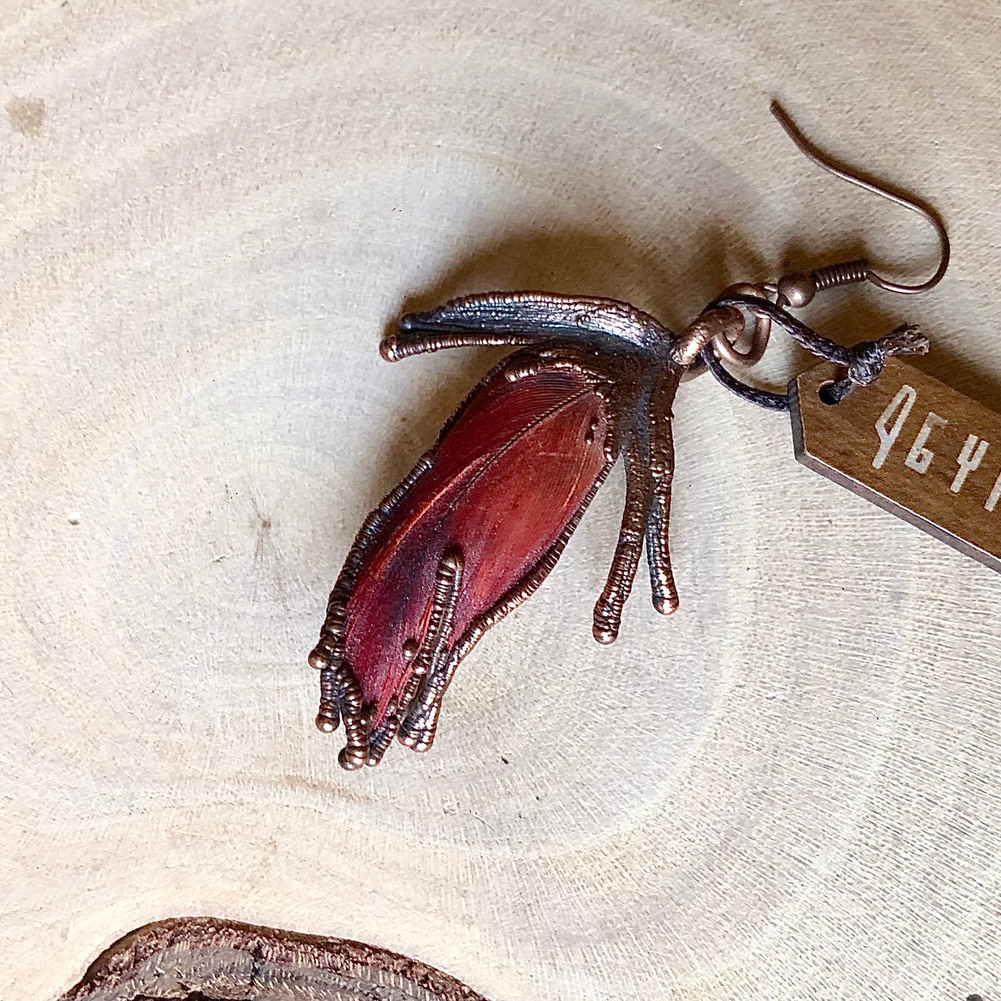 RED PARROT FEATHER SINGLE EARRING