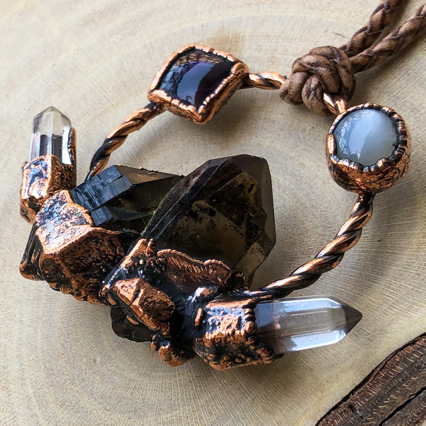 ST. CATHERINE’S SMOKY QUARTZ, CLEAR QUARTZ, MOONSTONE & AMETHYST