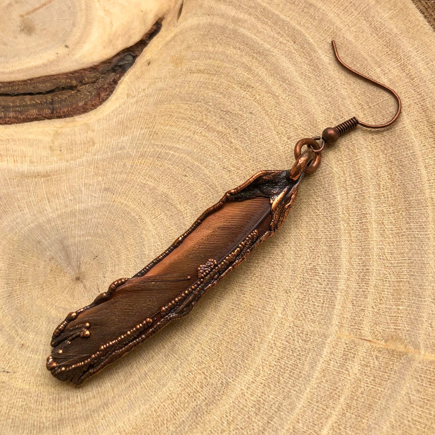 RED PARROT FEATHER SINGLE EARRING