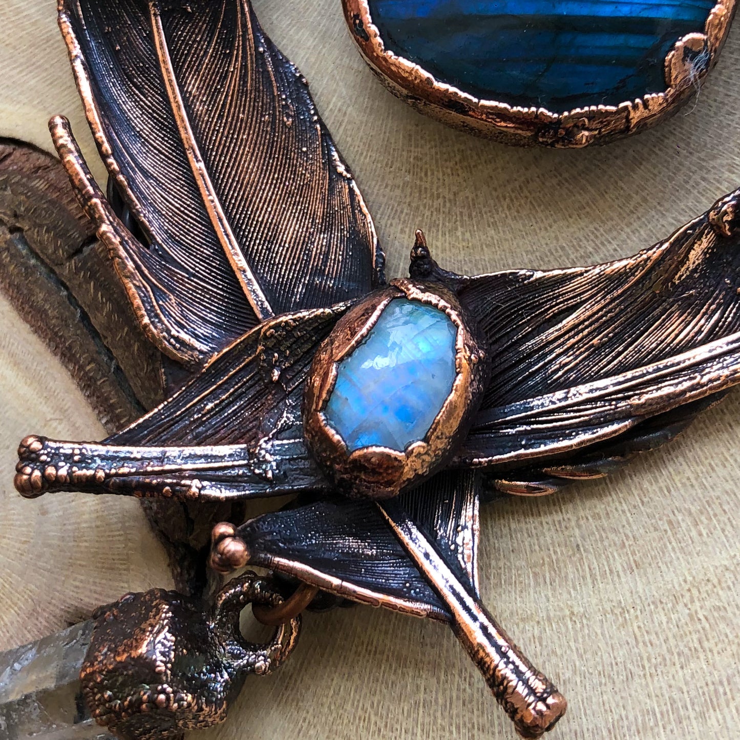 LABRADORITE, MOONSTONE, LEMURIAN QUARTZ & AMETHYST ON PIGEON FEATHERS