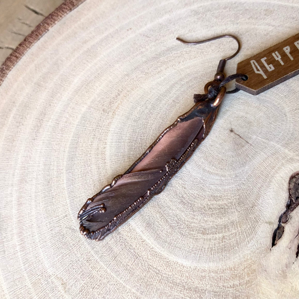 RED PARROT FEATHER SINGLE EARRING