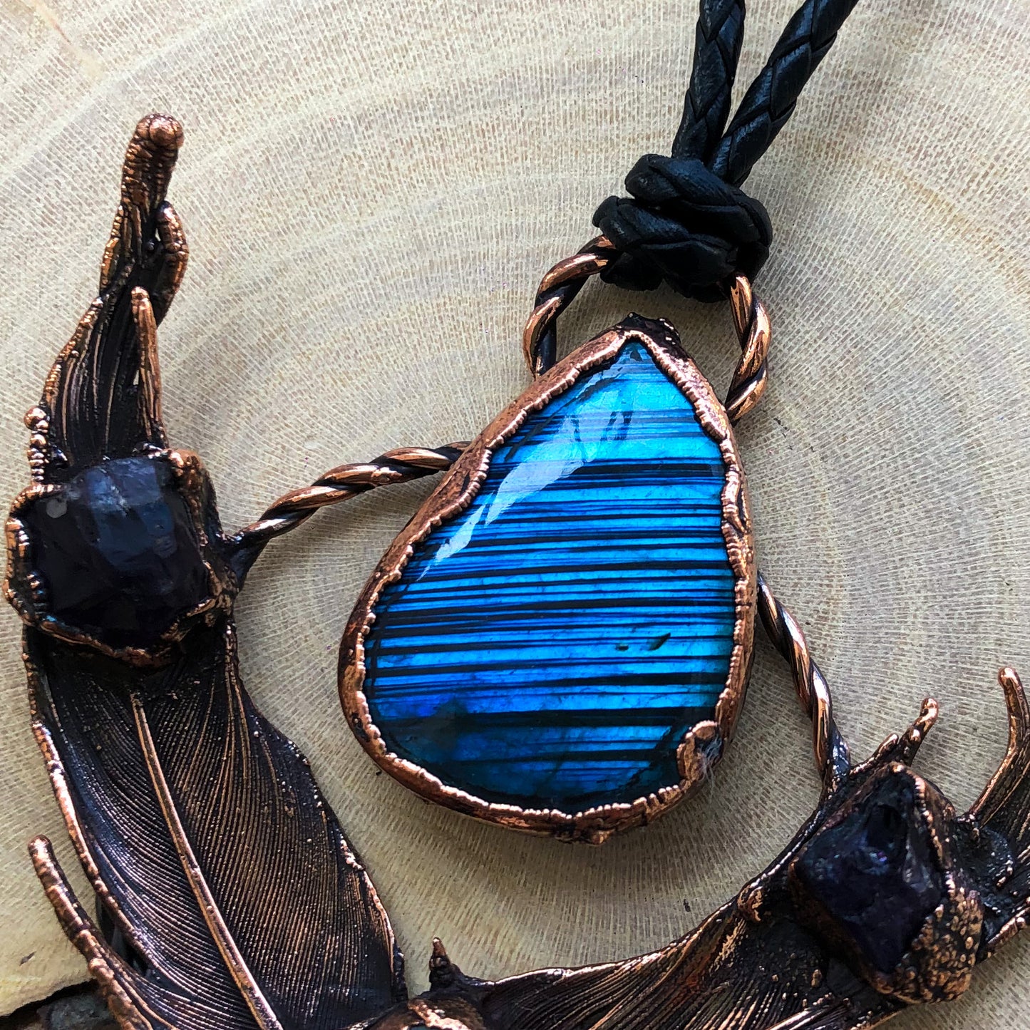 LABRADORITE, MOONSTONE, LEMURIAN QUARTZ & AMETHYST ON PIGEON FEATHERS