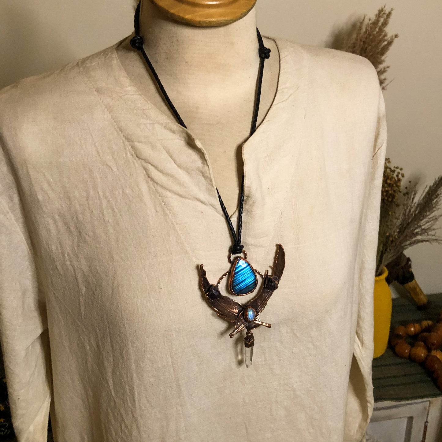 LABRADORITE, MOONSTONE, LEMURIAN QUARTZ & AMETHYST ON PIGEON FEATHERS