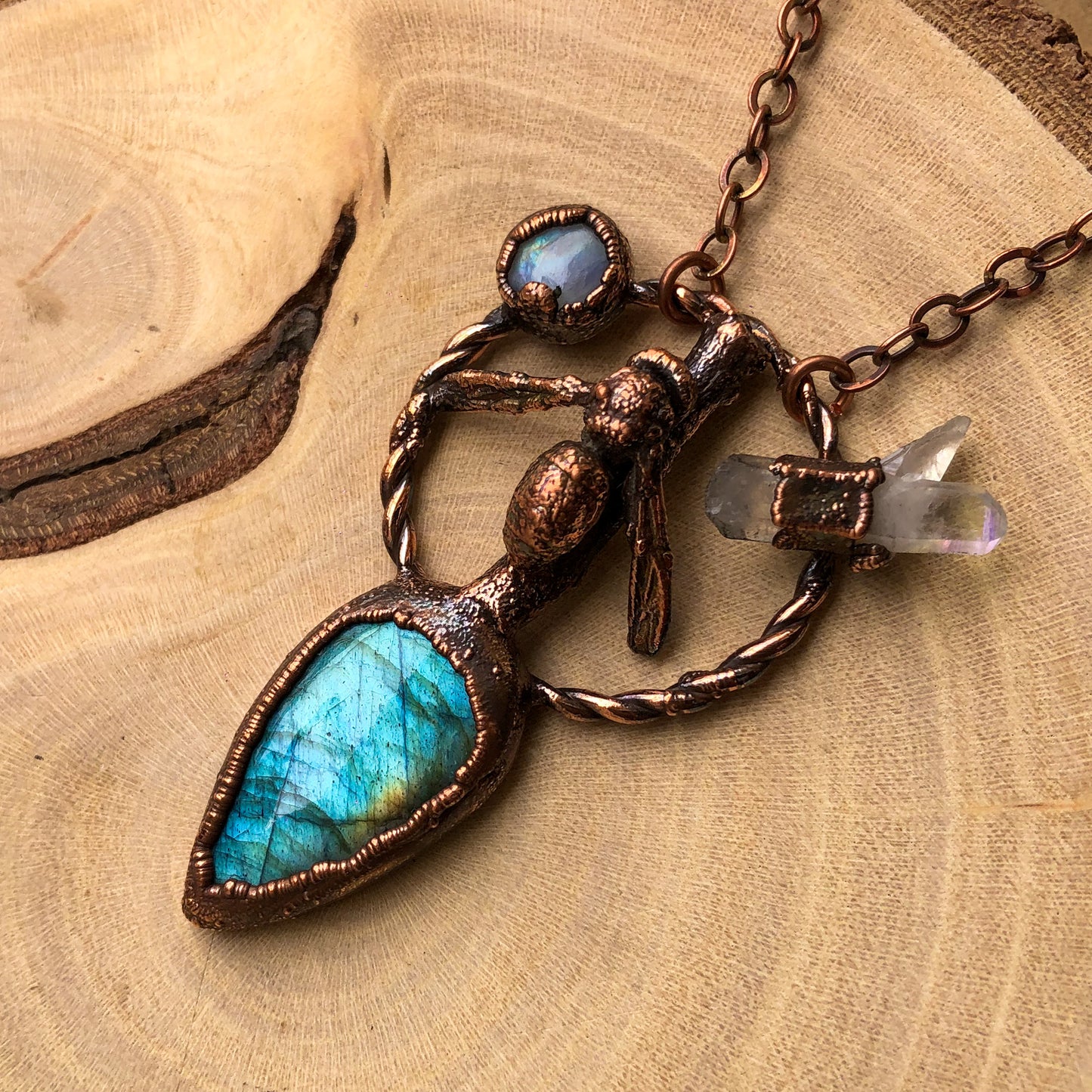 REAL BEE ON NATURAL TWIG WITH LABRADORITE, MOONSTONE & LEMURIAN QUARTZ