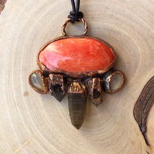 POLISHED SEA SHELL, ST. CATHERINE’S SMOKY QUARTZ & MOONSTONE